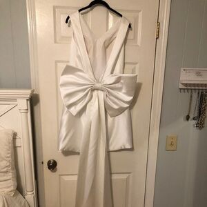White satin mini dress with extra large long bow in back, medium, excellent!